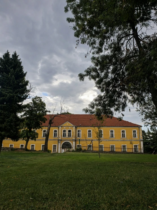 the house sits alone on an overcast day in the middle of nowhere