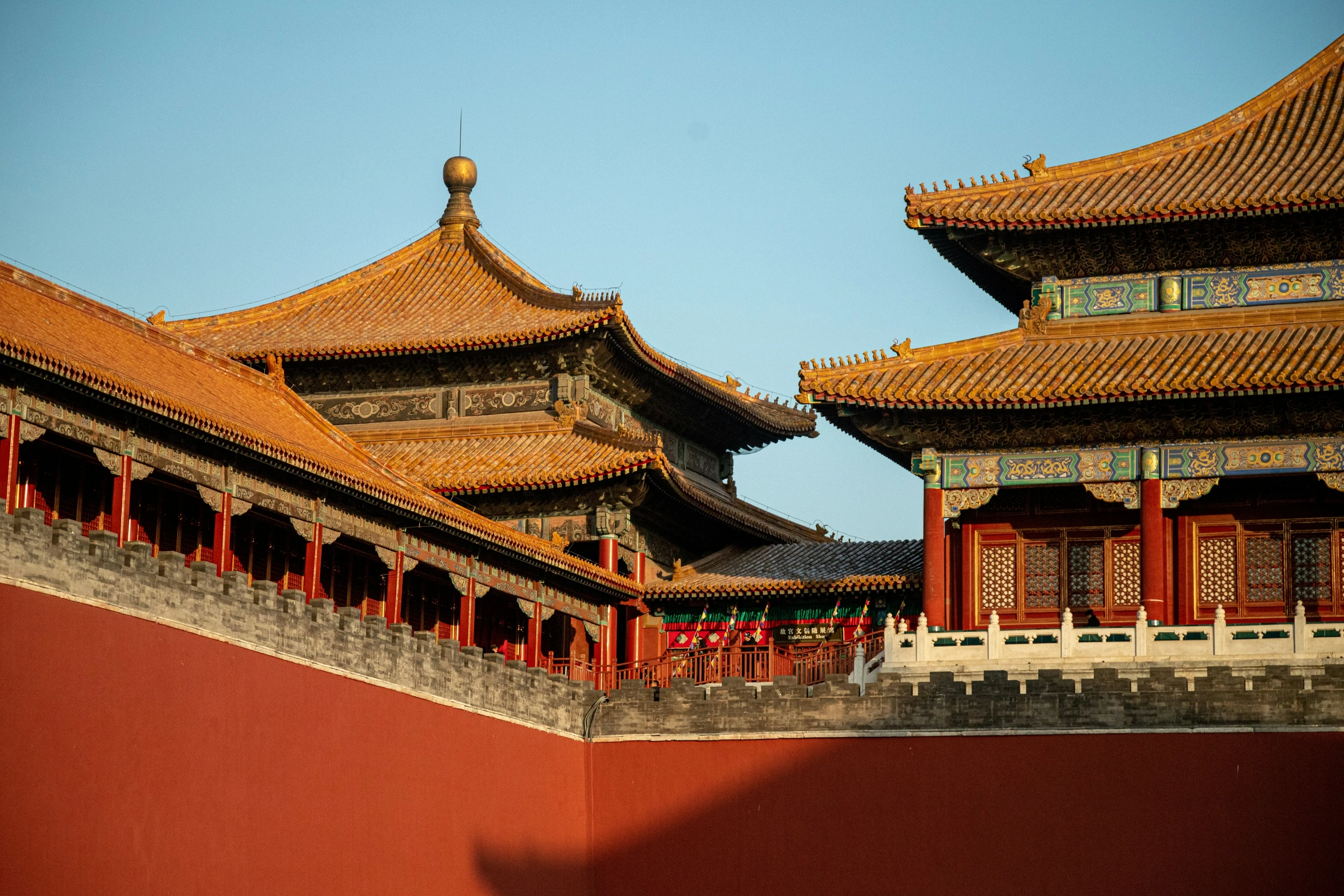 a wall and towers next to each other