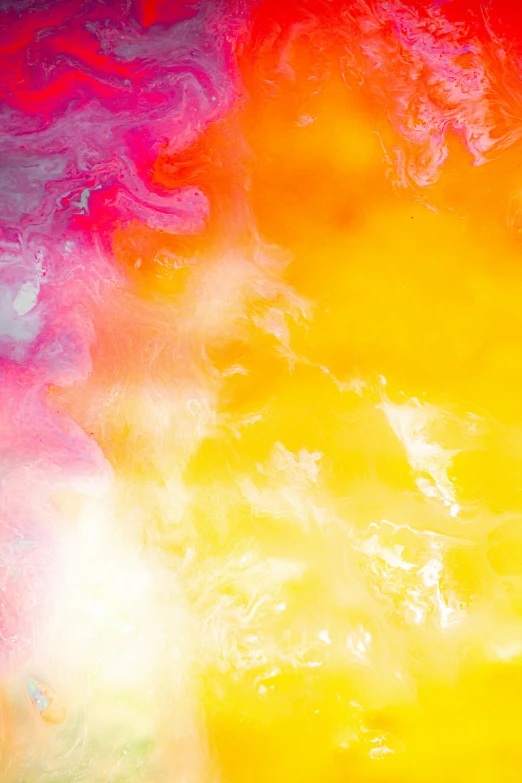 a multicolored background with a red blue yellow orange and black