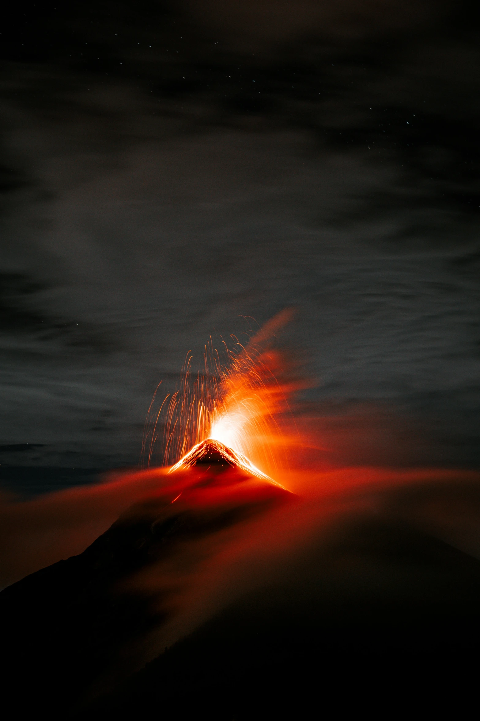 a very close up picture of a volcano with bright lights