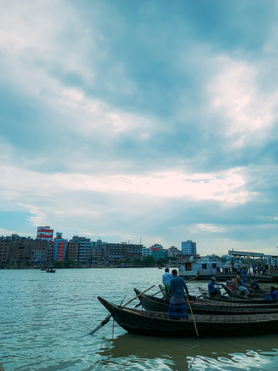 some boats are traveling in the water