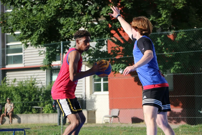 there is a young man about to kick a ball