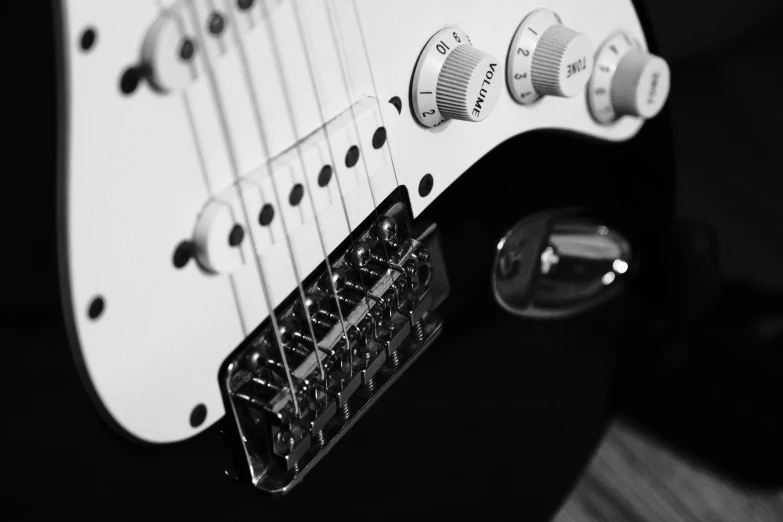 black and white pograph of an electric guitar