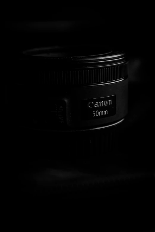 a black and white po of a canon lens