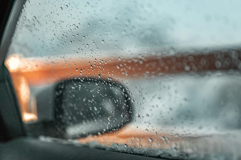 rain covered windshield from inside of a vehicle