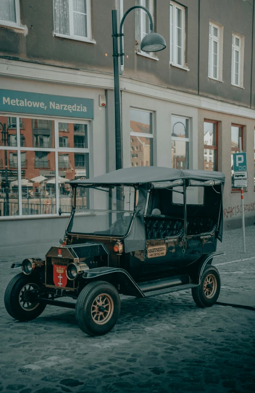 a car sits parked on the side of a road