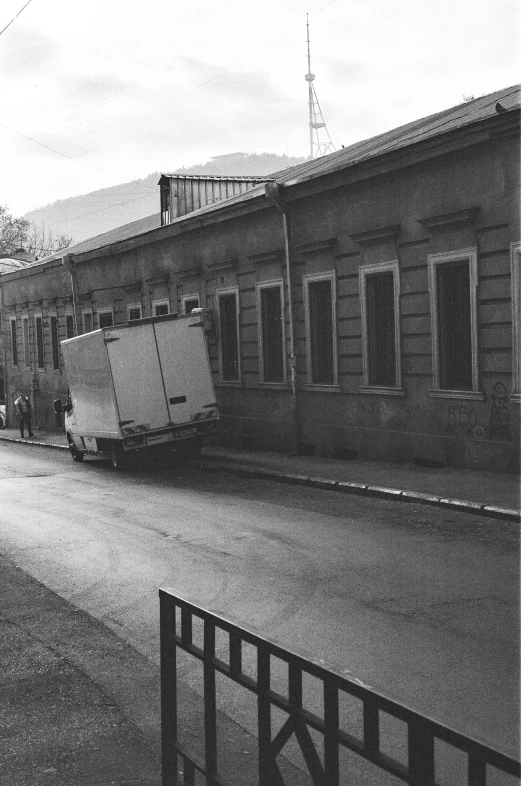 a black and white po of an abandoned truck