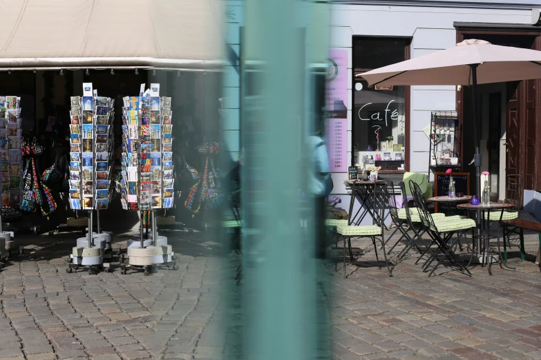 an outdoor marketplace, displaying various items for sale