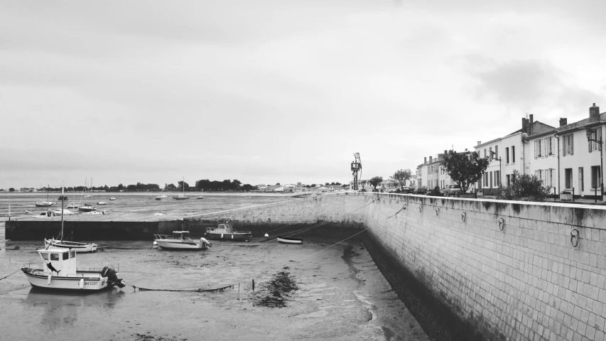 a black and white po of boats in the water