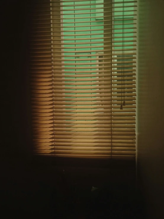 shadows and lights on the windows of the sun shining through the blinds