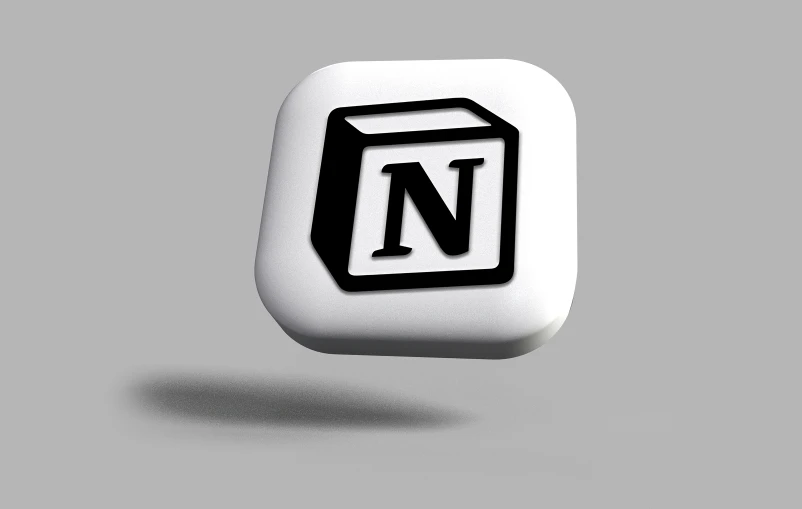 a cube shaped object with the letter n above it