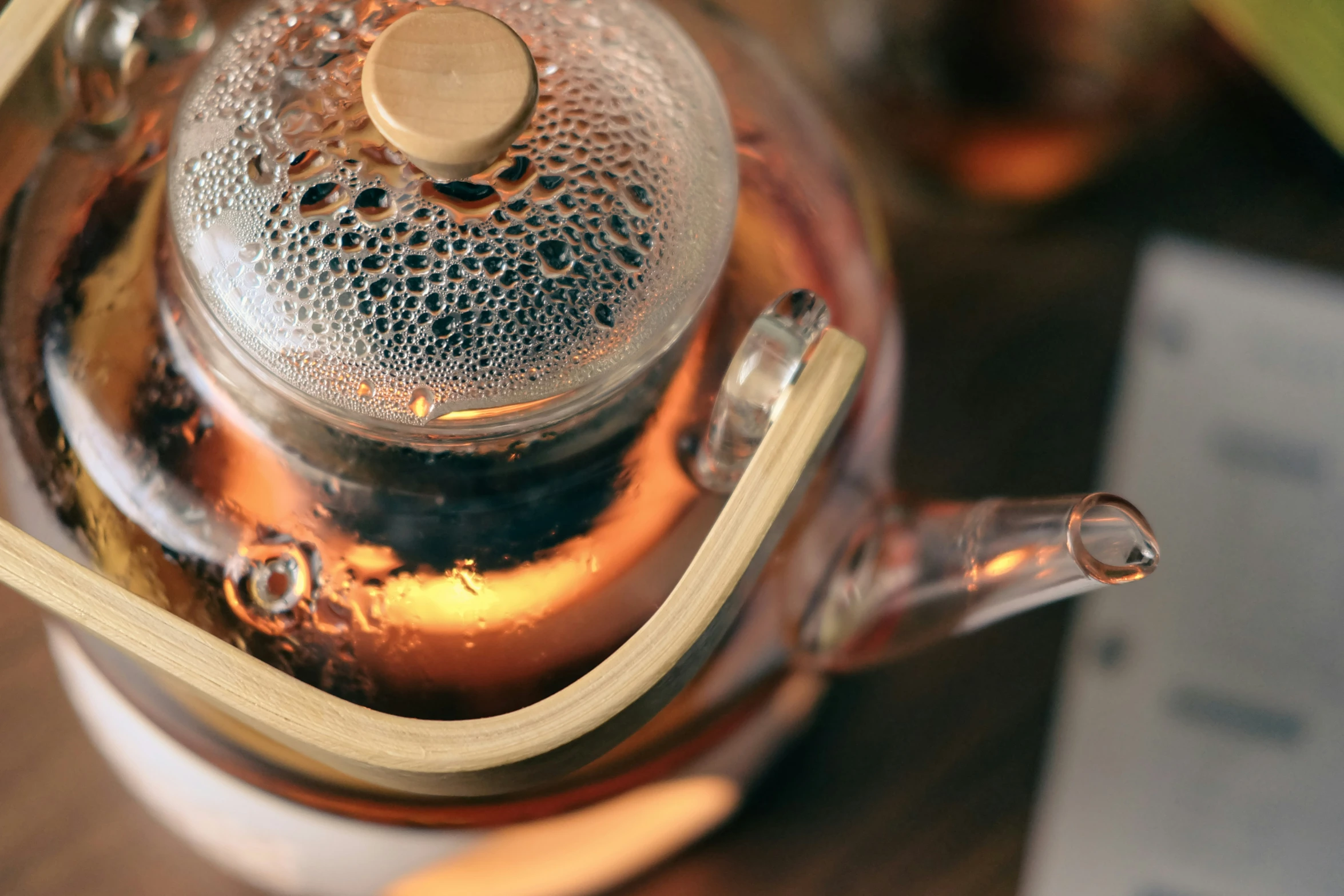 a closeup of a tea pot with a water in it