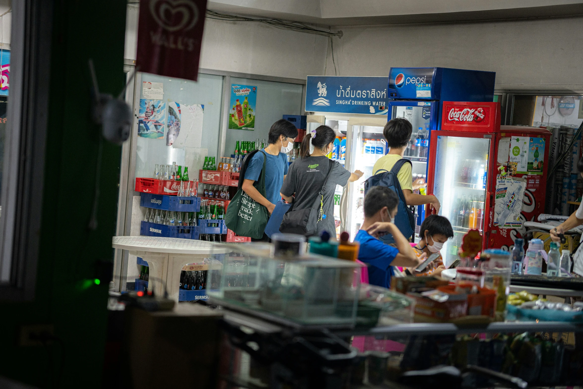 people shop for food at an oriental shop