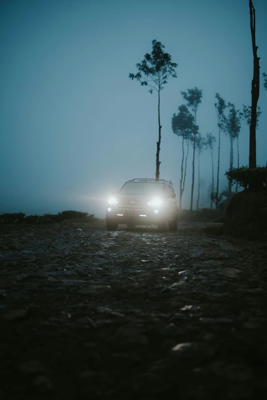 cars driving along the wet road in the rain