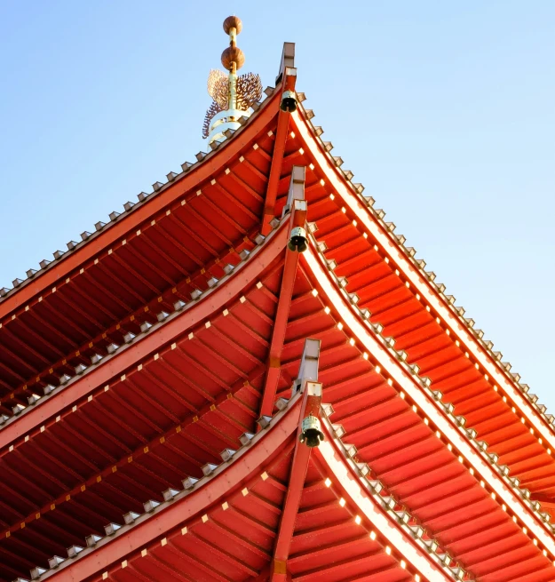 some people are standing on a small roof