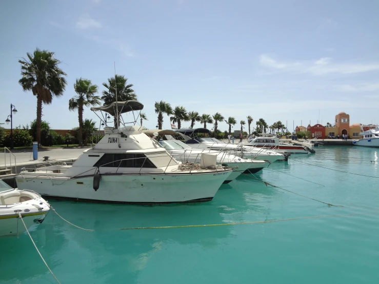 there are many boats parked in the dock area