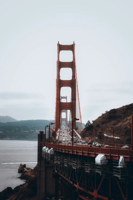 a very tall bridge spanning across the water