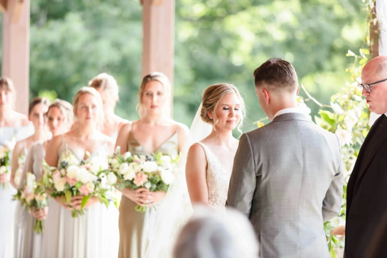 the bride is getting married at this outdoor ceremony