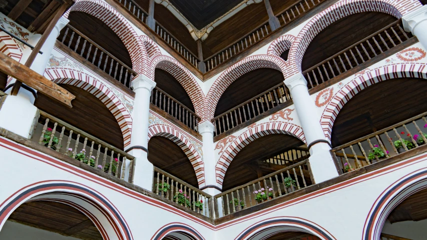 a po taken from the bottom of an elaborately designed ceiling