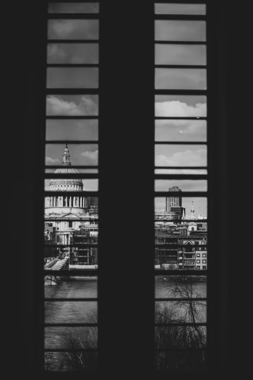 a large building seen through two windows