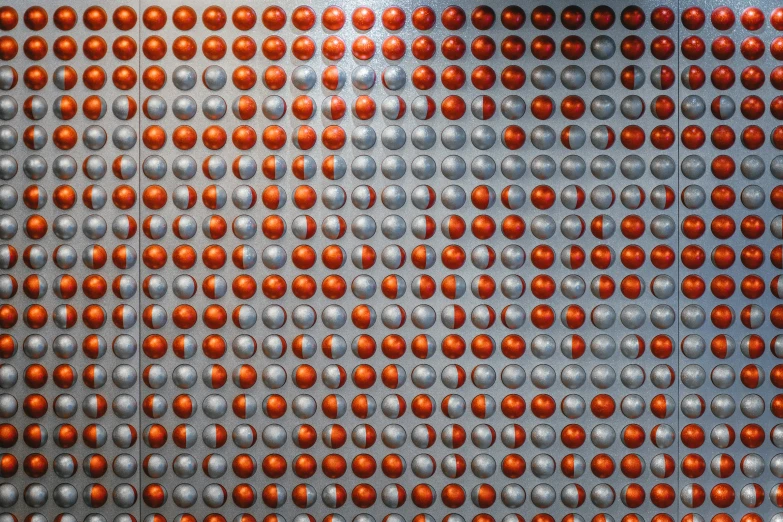 oranges are in the background on an aluminum surface