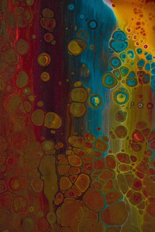 an abstract painting of water drops and yellow and blue hues