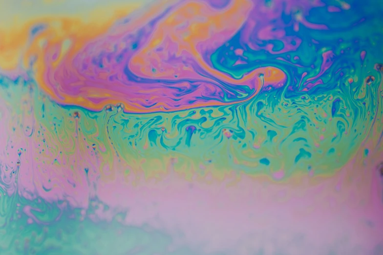 a large colorful substance appears to be fluidly swirled