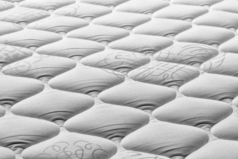 a close up s of a mattress top with many small ons