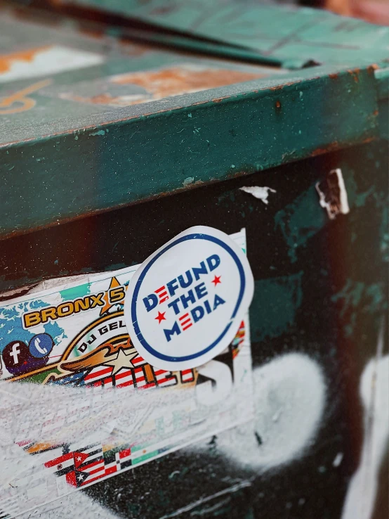 this is a sticker on a garbage can