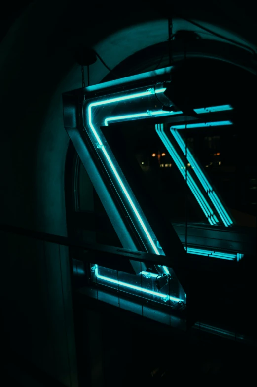 a large letter that is lit up in the dark