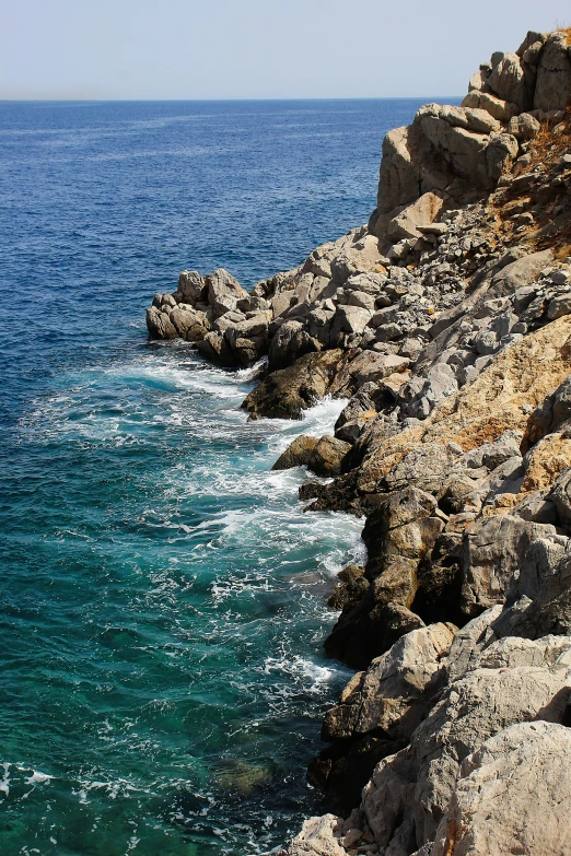 a po of some rocks on the shore