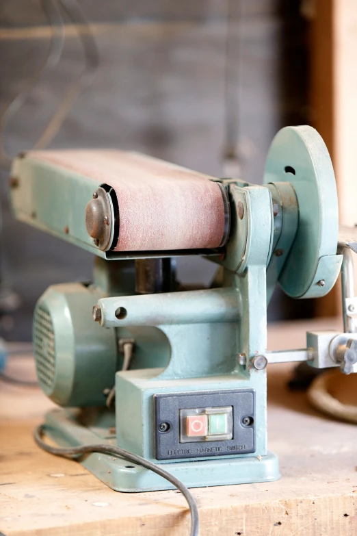 the vintage machine has an upholstered fabric pad