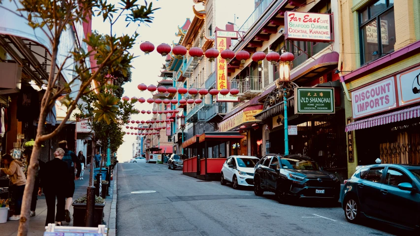 a street with cars parked on the side of it