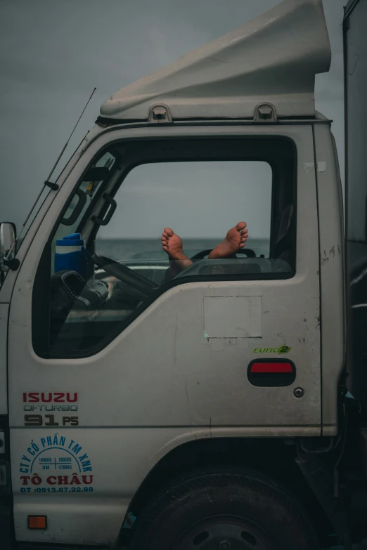 an empty van with one hand in the back