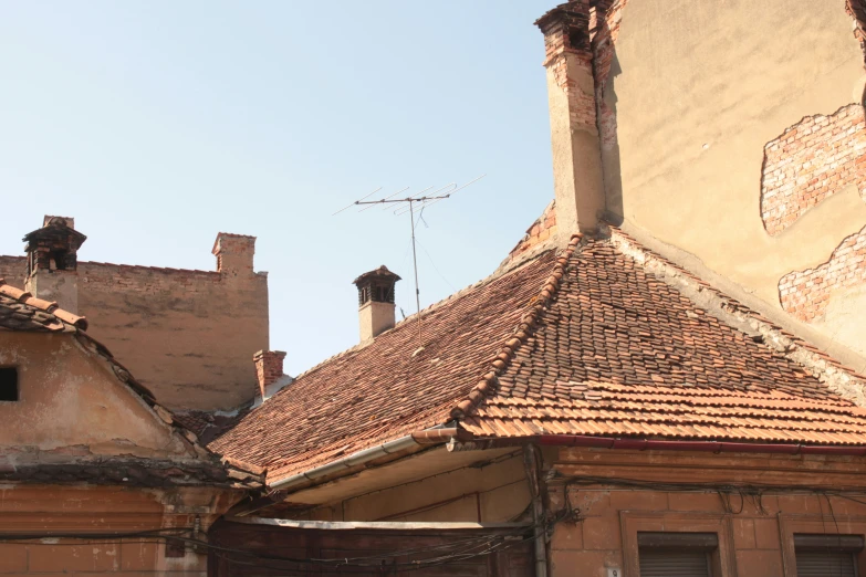 a po taken of the rooftop of two old buildings