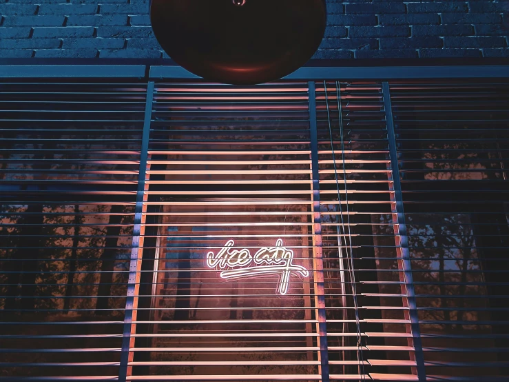 a large circular light sitting on top of a metal slats