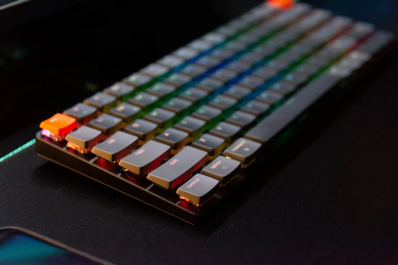 a close - up of the keys of a keyboard with glowing keys