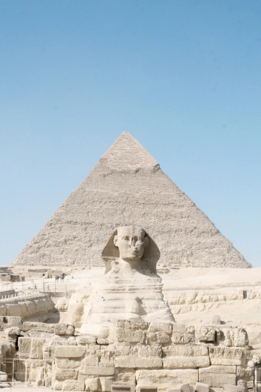 there is a statue of an egyptian lion next to a sphinx in egypt