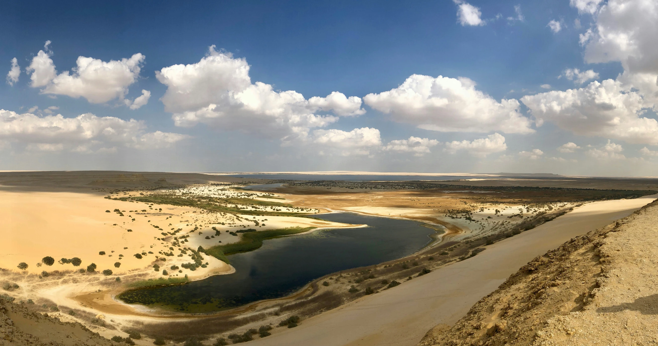 a view looking down on a vast desert area