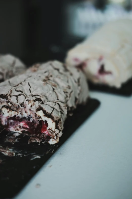 a chocolate desert with berry filling is shown