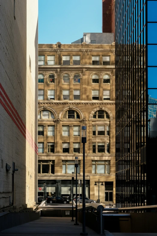 a large building is standing near other buildings