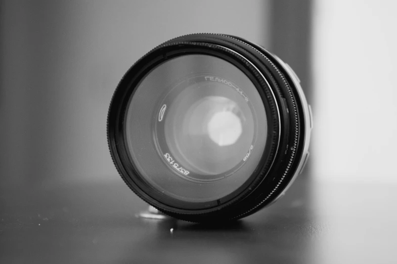 a camera lens sitting on a counter top