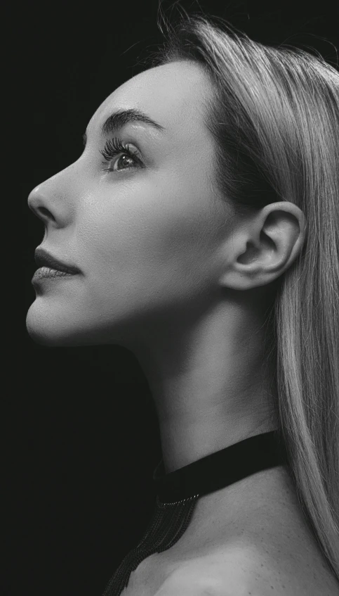 black and white portrait of woman wearing neck tie