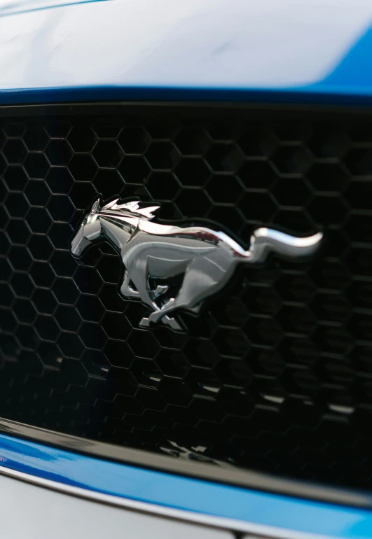 an official ford grille with a stylized image of the horse