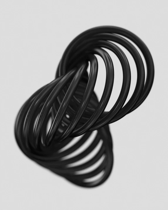 a stack of black wire against a white background