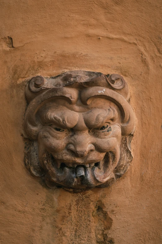 this is a stone carving depicting a chinese god