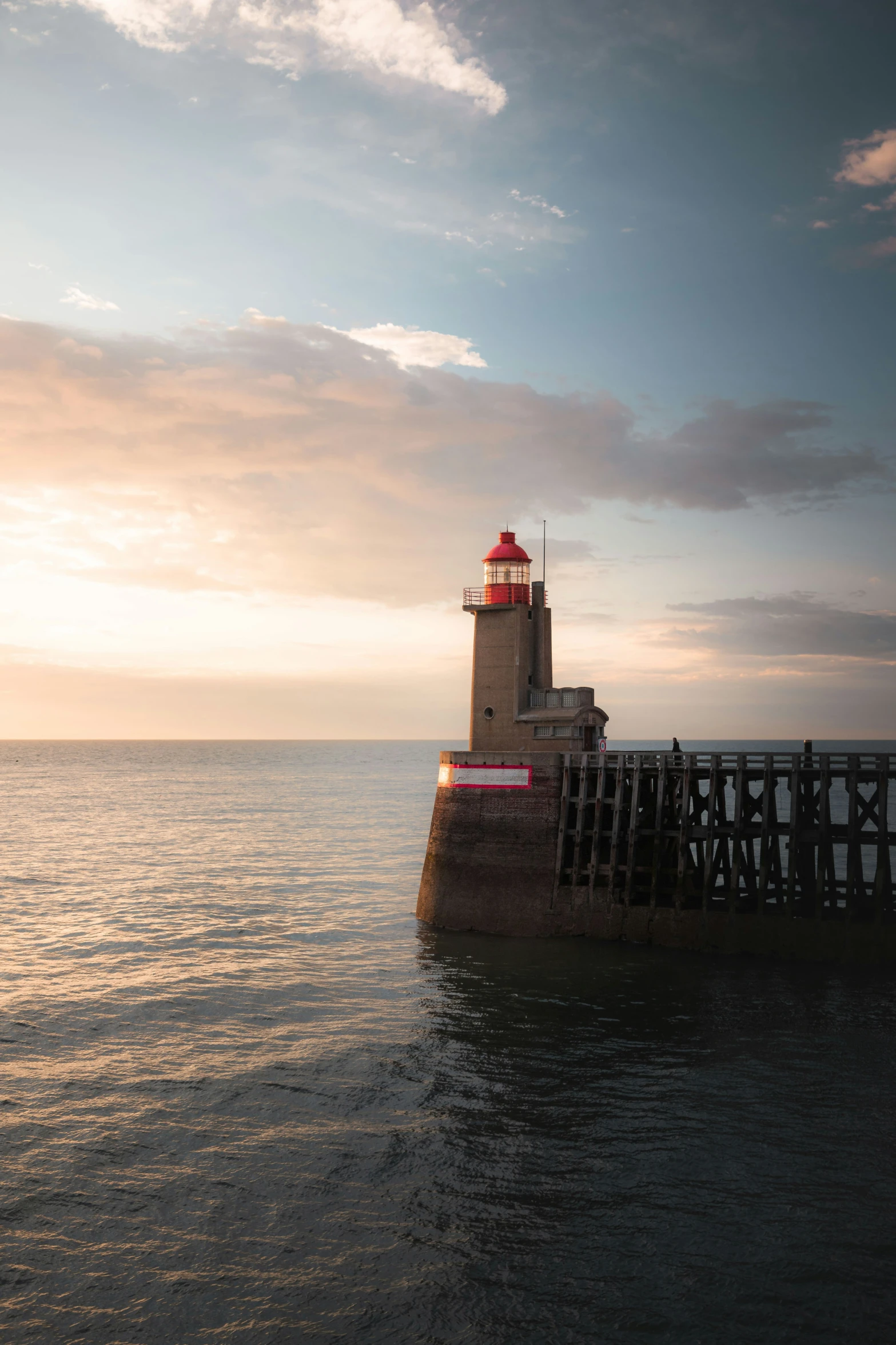 a pier with a tower on top of it