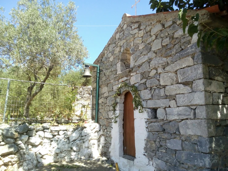 an old, run down house with an interesting door