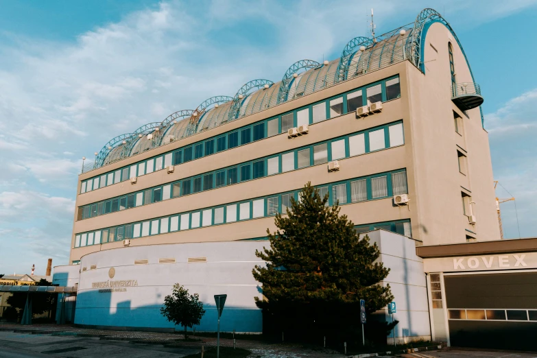 an apartment building with an airplane on the roof