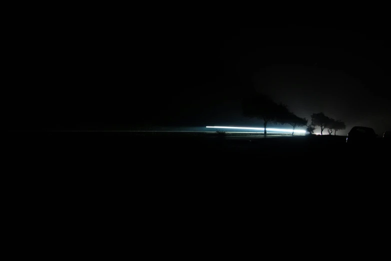 a long exposure of light in the dark